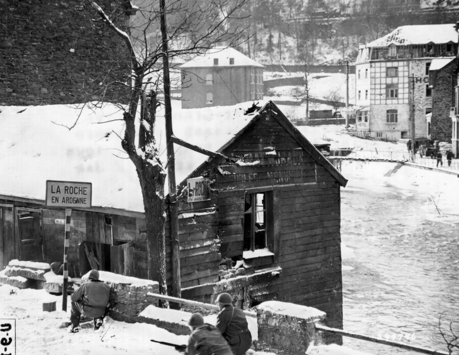 American soldiers move through La Roche, Belgium, during the Battle of the Bulge. Task Force Hogan reached La Roche on December 19, 1944, and Hogan’s men made a stand along with an assault-gun platoon in defense of the town. The remainder of Hogan’s command kept moving northward.