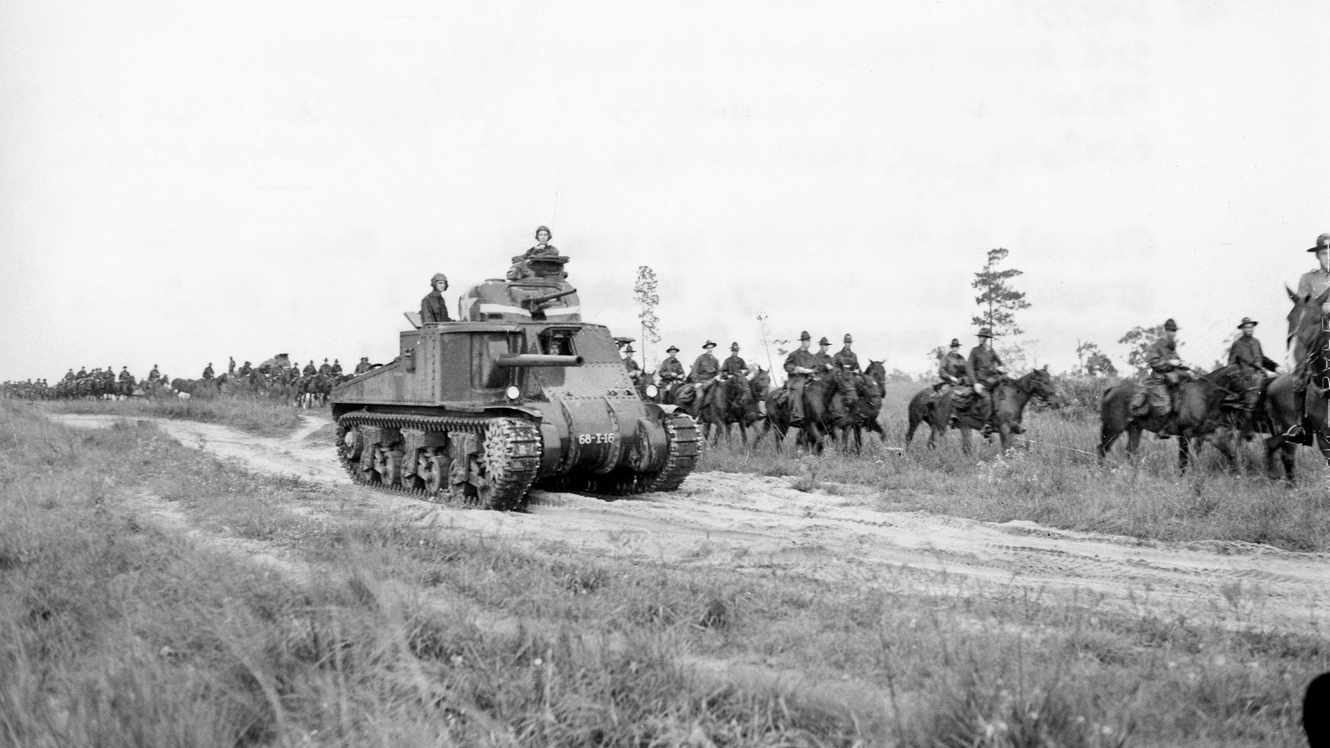 An M3 tank and mounted cavalrymen of the Third Army participate in training maneuvers in Louisiana in 1942. Training was critical as the American army grew from fewer than 500,000 members in 1939 to more than eight million men and women in 1945.
