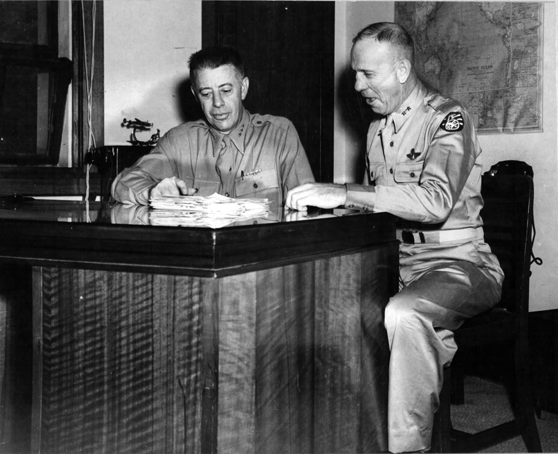 General George Kenney (left) and Ennis Whitehead confer during air operations in the South Pacific. Merian Cooper served with both men as chief of staff of the U.S. Fifth Air Force in the Pacific theater.