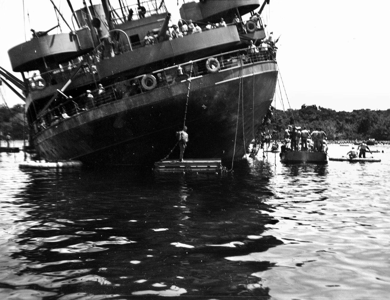 After a pair of sea mines detonated under the hull of the troop transport SS President Coolidge, the ship remained afloat for 78 minutes before sliding beneath the surface. 