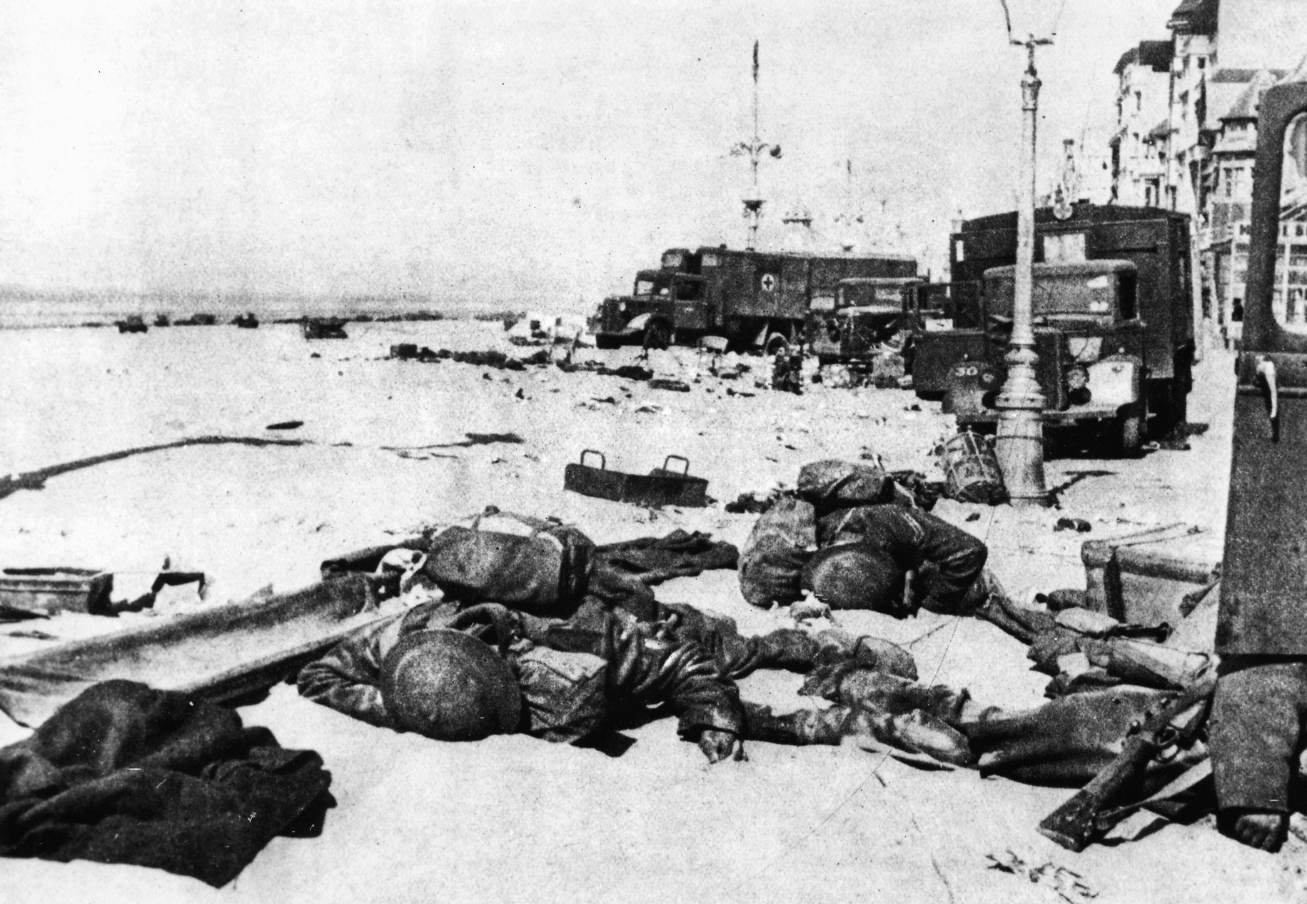 British dead and the debris of war litters the beach at Dunkirk following the British evacuation during Operation Dynamo. The Germans captured large quantities of weapons and supplies, while 50,000 British  soldiers were left in France,11,000 of them killed and the remainder taken prisoner. 