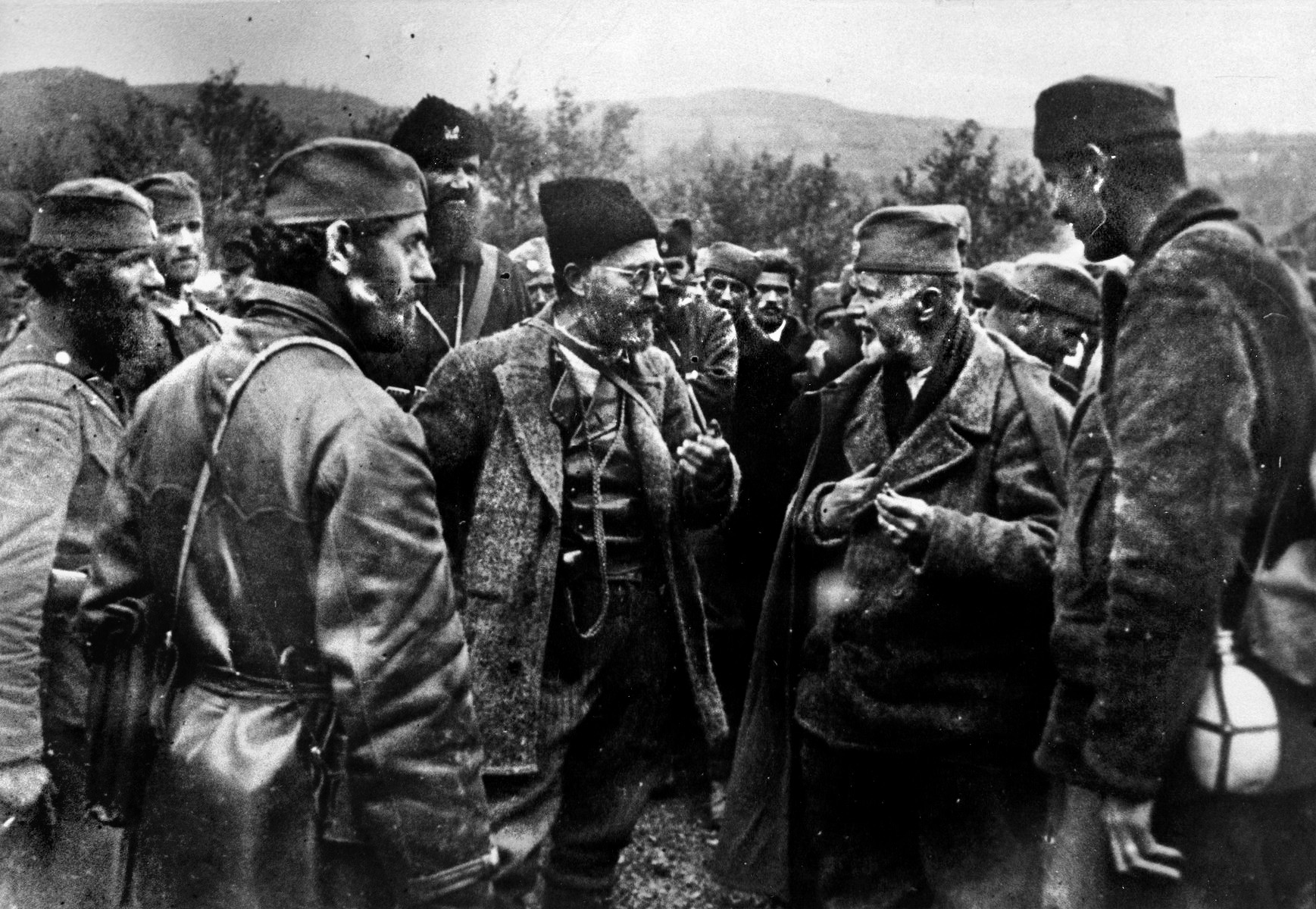 Chetnik leader Drazha Mihailovich talks with a group of his senior commanders. By the end of World War II, the Chetniks’ ranks had been seriously depleted, with only a handful holding out in a mountainous area. They were eventually captured by Tito’s communist security troops.