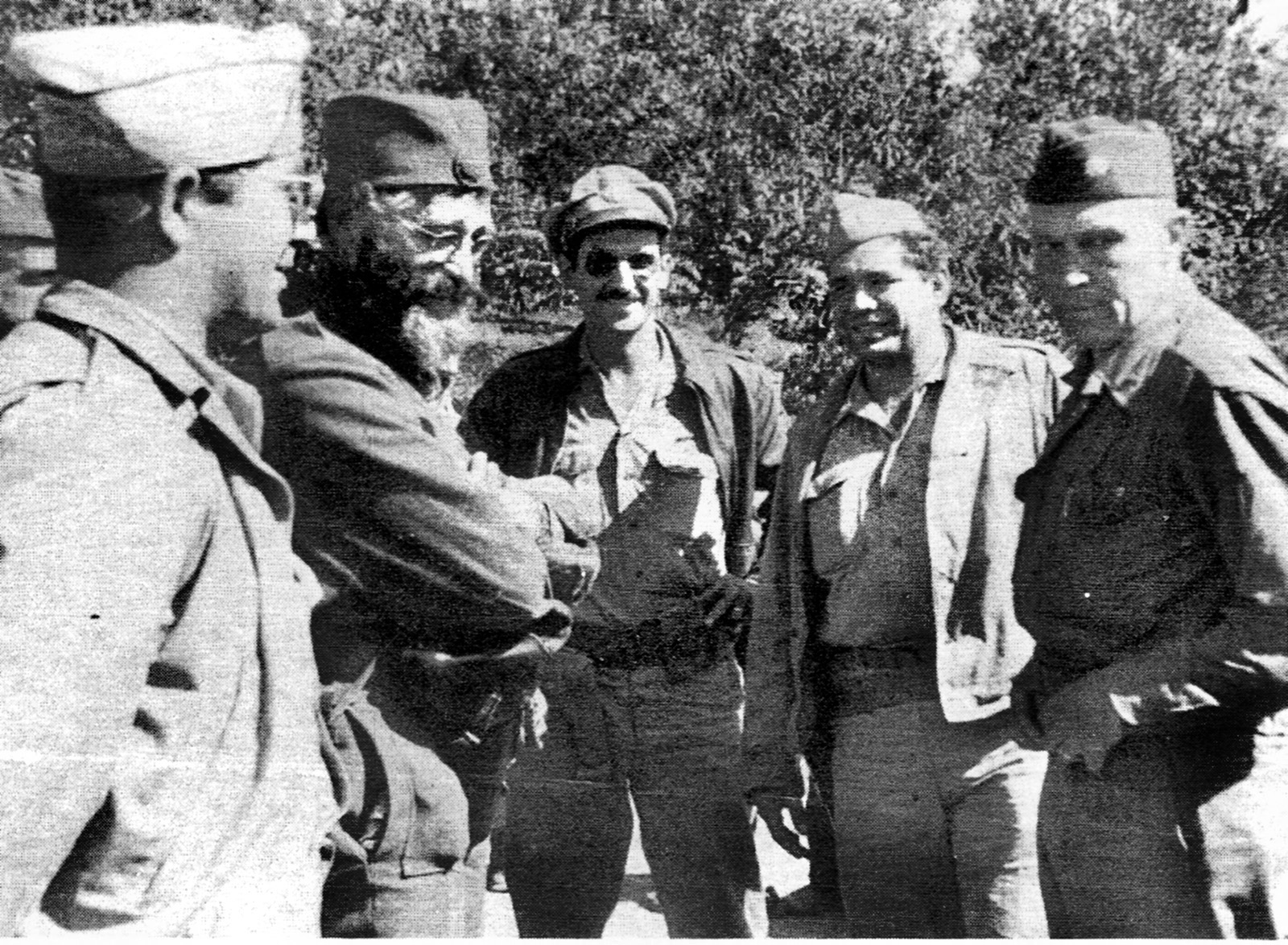 The OSS operations team and its Chetnik partners that successfully accomplished the rescue of many downed American airmen in Yugoslavia during Operations Halyard and Ranger included, left to right, Michael Rajacich, Drazha Mihailovich, Nick Lalich, George Musulin, and Robert McDowell. OSS member George Vujnovich took the photo. 