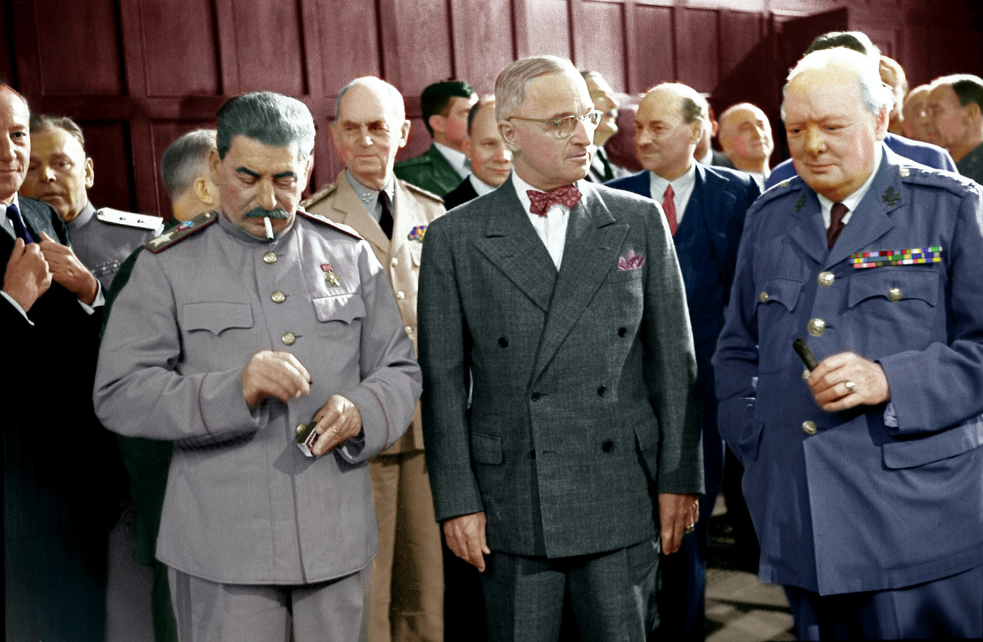 Soviet Premier Josef Stalin, U.S. President Harry Truman, and British Prime Minister Winston Churchill (left to right) pause following a meeting during  the Potsdam Conference held July-August 1945.  At Potsdam issues concerning the map of post-World War II Europe and spheres of influence were  discussed.  Churchill was voted out of office during the conference and replaced by Clement Attlee, while Truman had assumed the U.S. presidency after the death of Franklin D. Roosevelt.