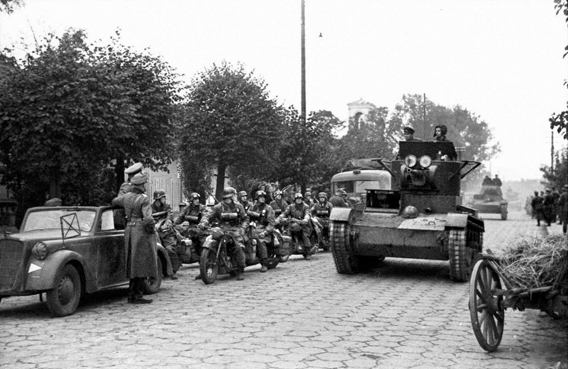 After linking up with their German partners in aggression, T-26 tanks of the Red Army's 29th Tank Brigade join a staged triumphal parade in occupied Poland. Less than two years later, Hitler invaded the Soviet Union.