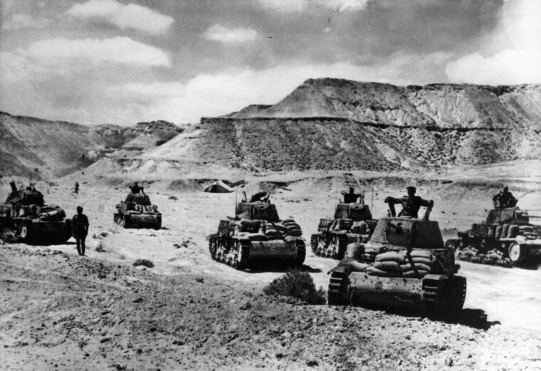 Italian tanks move forward in the vicinity of the Qattara Depression during the advance to El Alamein in the autumn of 1942.