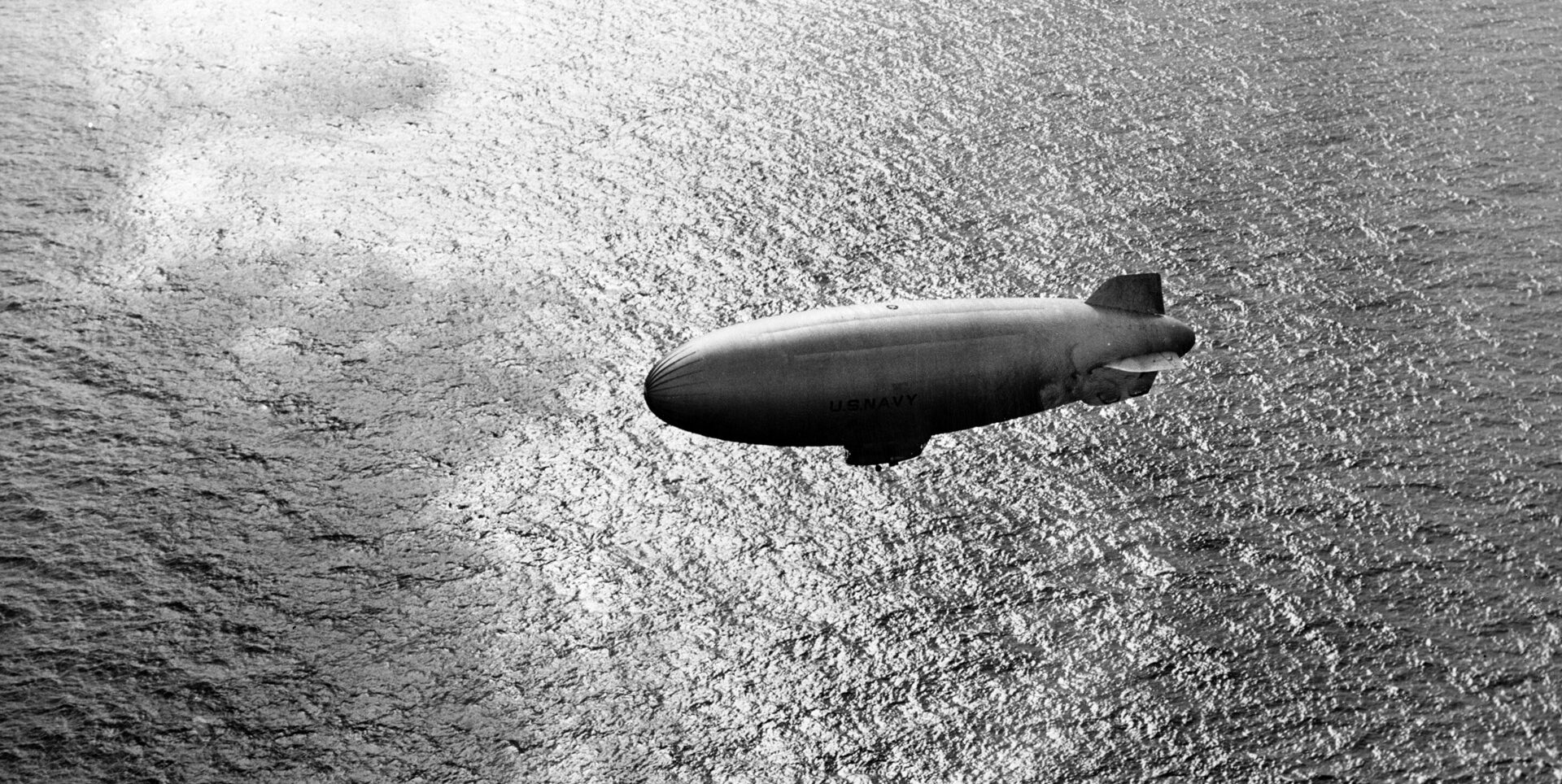 An airship of the the U.S. Navy patrols the Atlantic Ocean in search of German U-boats. This photo was taken in 1943, and at the time the Allies were wresting the initiative in the Battle of the Atlantic from the Nazis via improved sub-hunting technology and weapons systems.