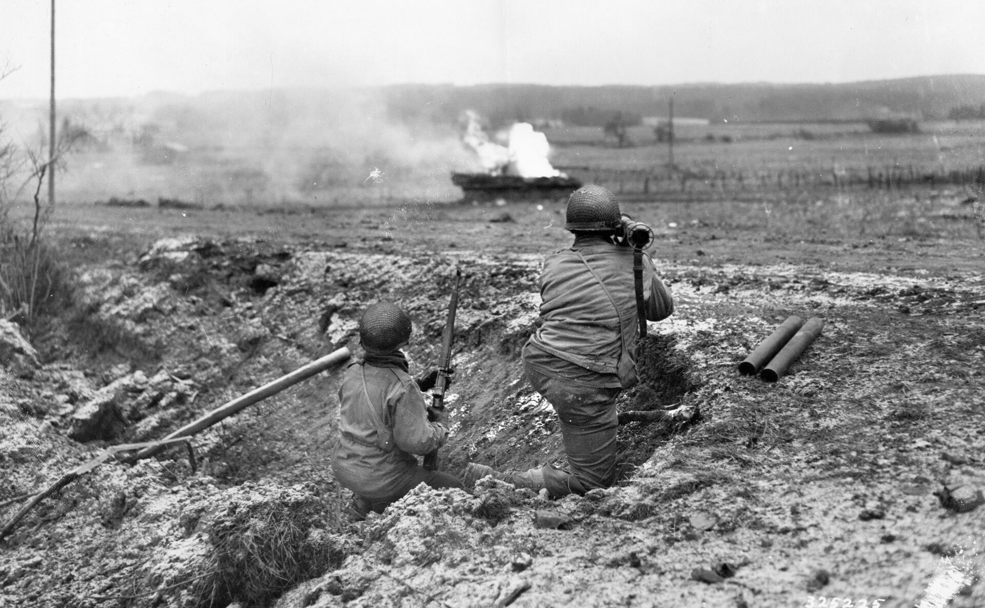 Bush fired a bazooka round at a German tank but it bounced off harmlessly. One of his fellow soldiers managed to halt the tank by blowing off one of its tracks. 