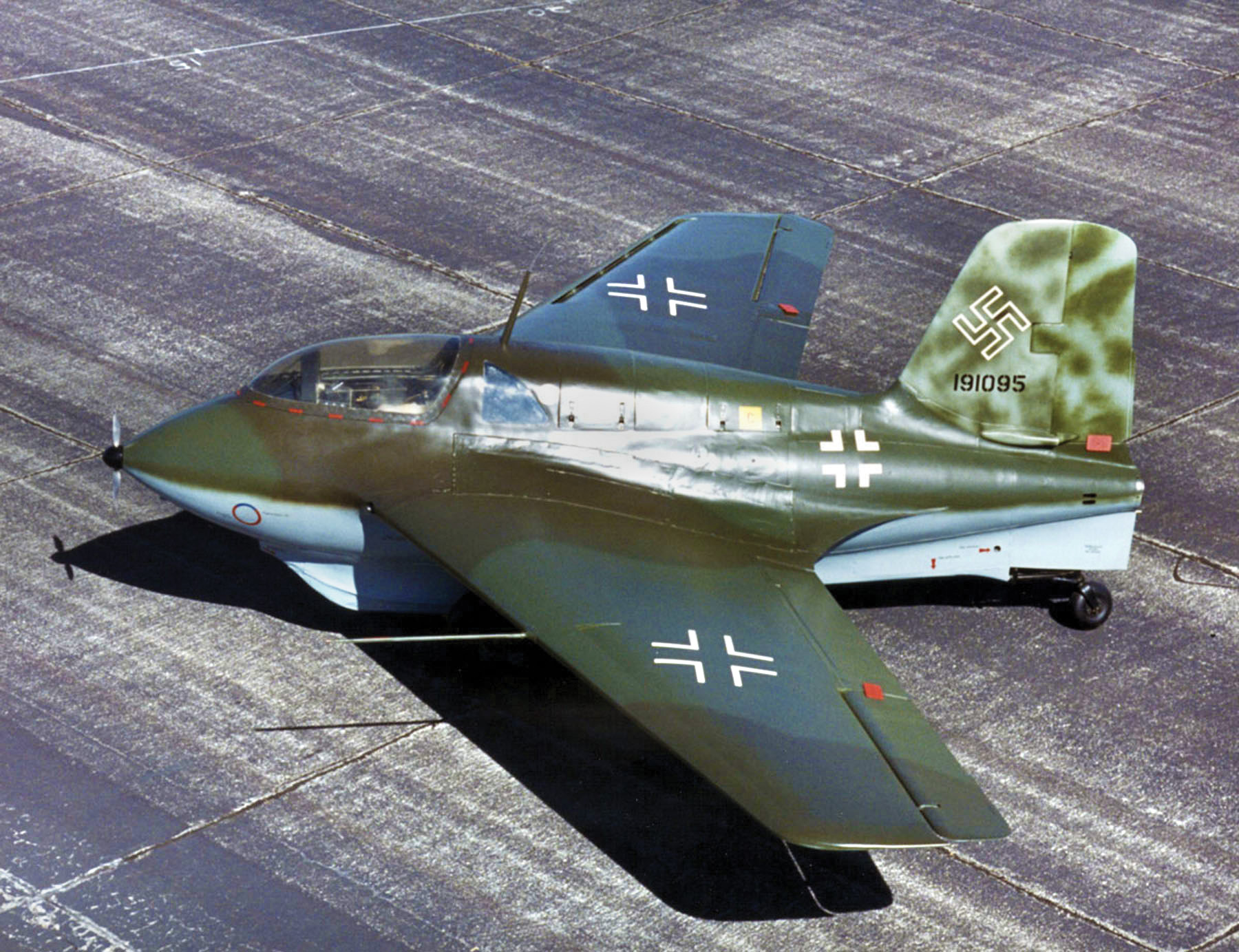 This Me-163B Komet, in the collection of the U.S. Air Force, bears evidence of sabotage, as forced laborers apparently used contaminated glue in the wing structure and lodged a rock between the volatile fuel tank and a support strap.