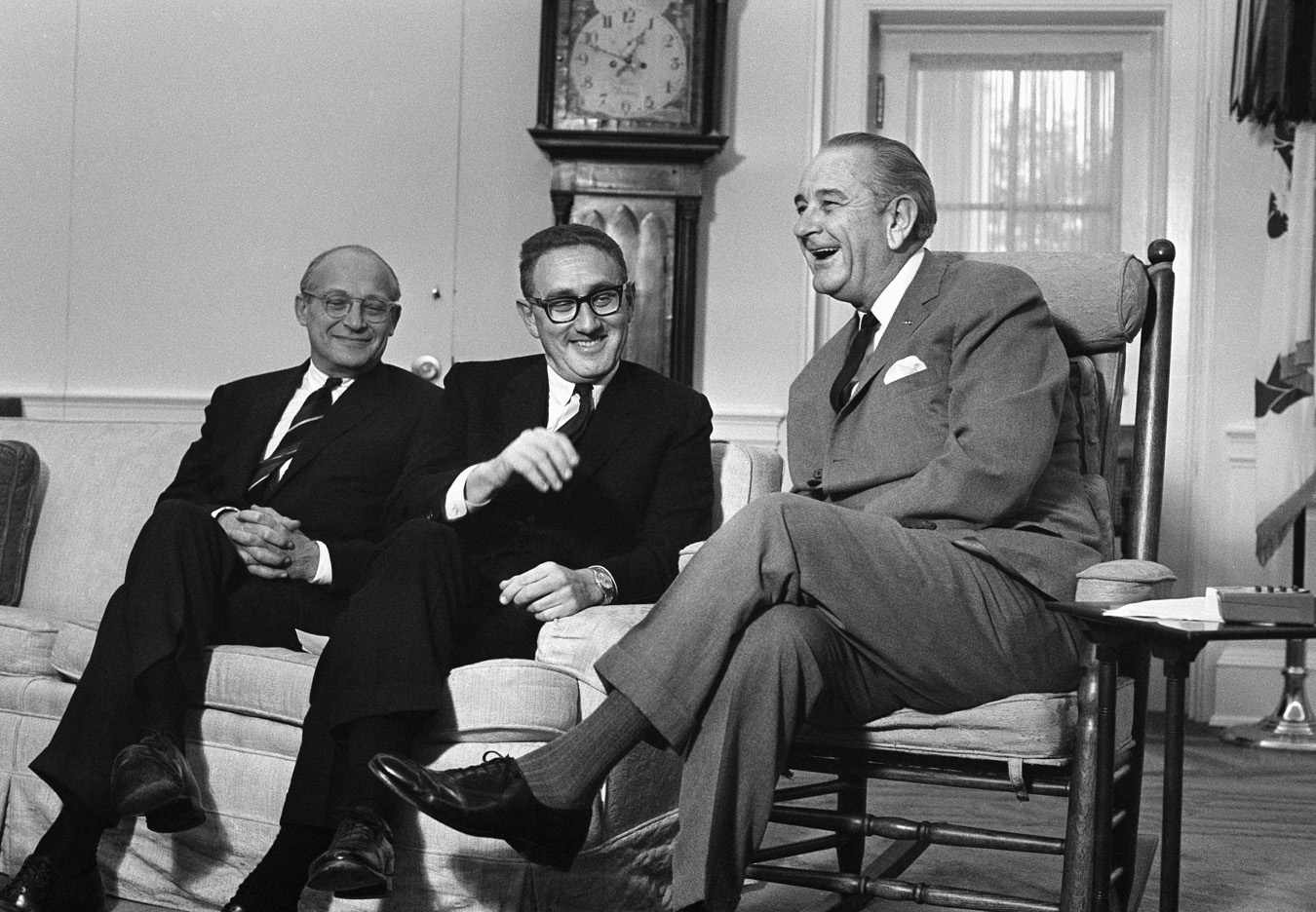 Kissinger sits with President Lyndon B. Johnson at the White House in Washington, D.C., in 1968. After World War II, Kissinger went on to a long and distinguished diplomatic career.