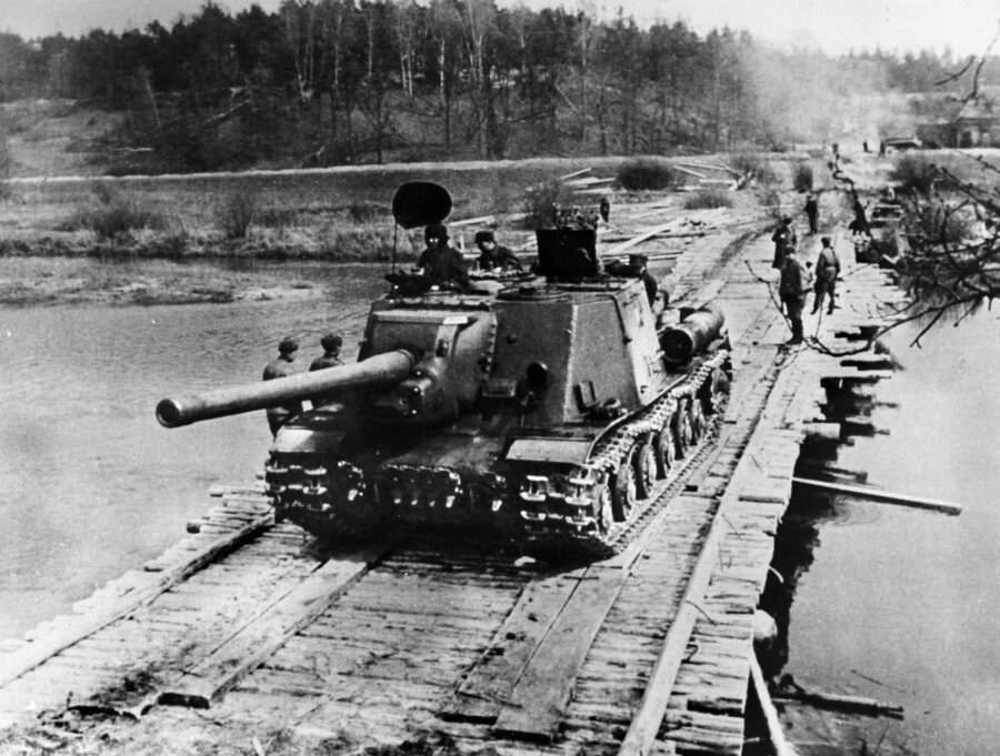 An ISU-152 heavy assault gun of the First Polish Division crosses the Oder. The Soviet self-propelled howitzer fired high-explosive rounds that could destroy reinforced bunkers, and also could blow the turret off of a German tank.