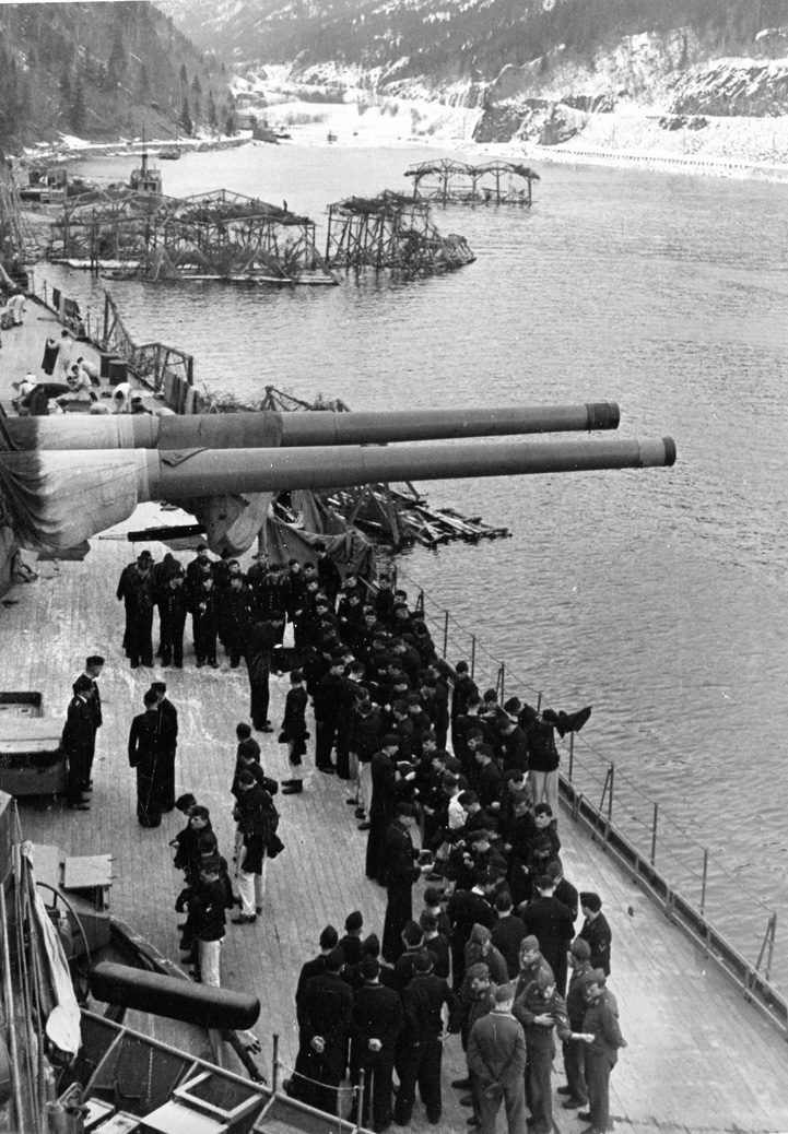 In addition to her own guns, the Tirpitz was protected by multiple antiaircraft batteries and antisubmarine and antitorpedo netting.