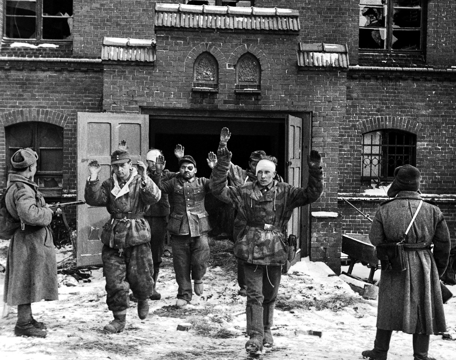 German soldiers, including several wounded, surrender to Russians in East Prussia. Most of the German prisoners captured by the Russians would not return from captivity.