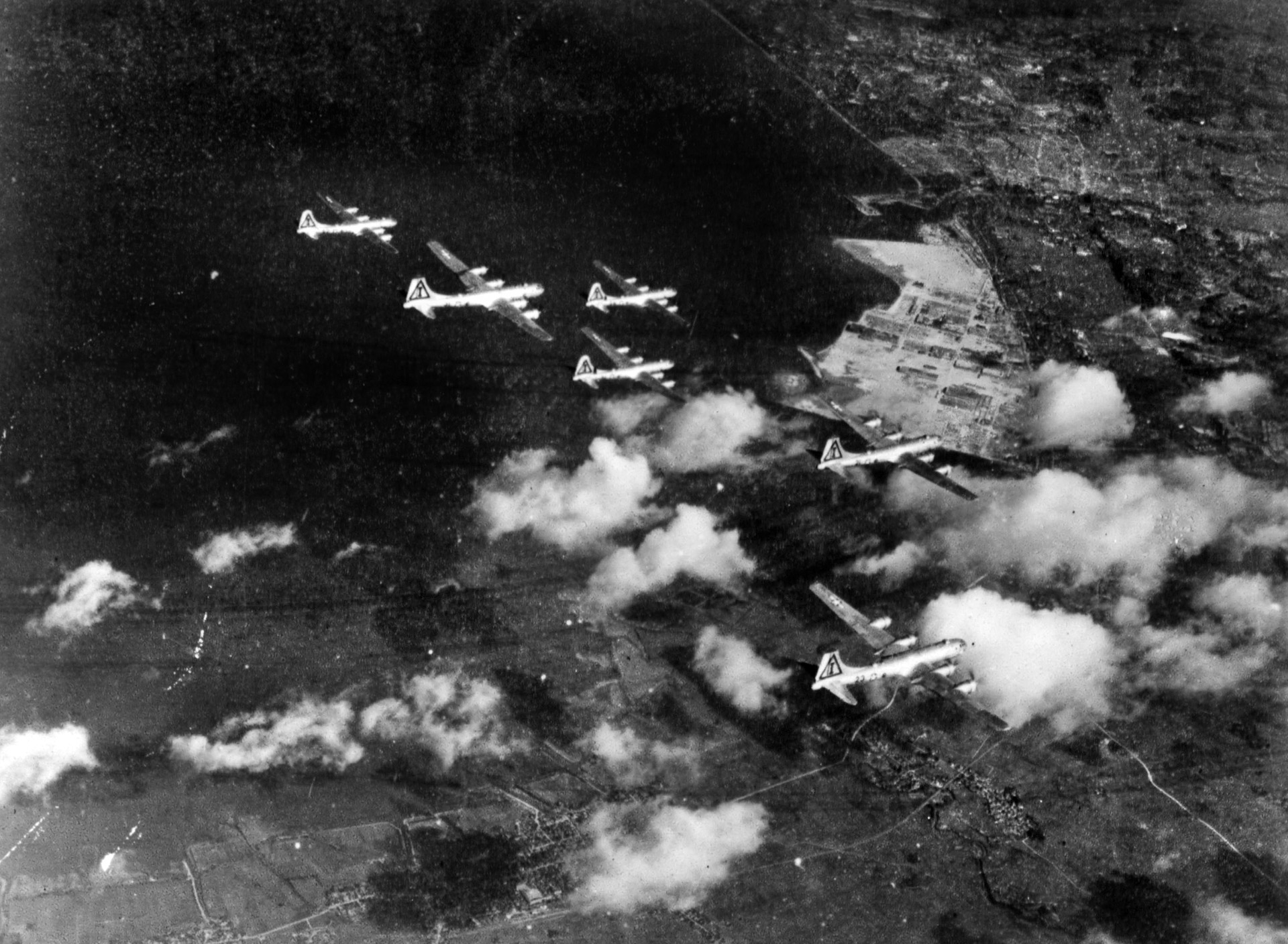 A formation of B-29s on their way to hit a Japanese factory complex. Tokyo was hit by 350 B-29s on March 9-10, 1945.
