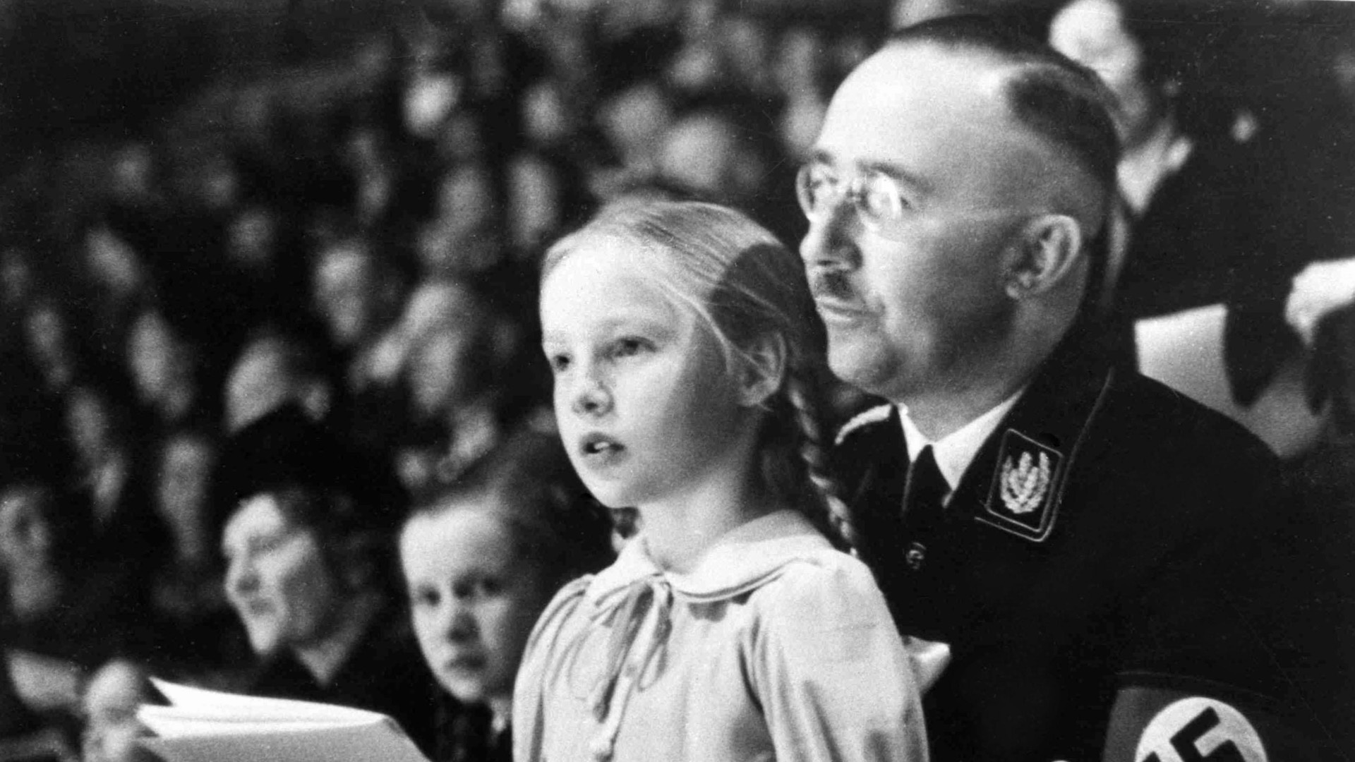 Gudrun Himmler with her father Heinrich at a Nazi sports festival, 1938.