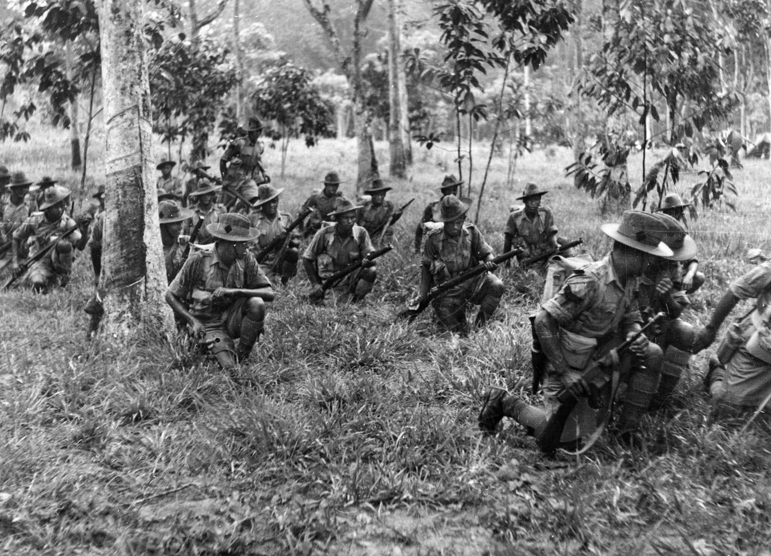 The 9th Gurkhas train in the jungle of the Malay Peninsula prior to the coming of war. The Gurkhas fought bravely and sustained heavy casualties in the futile defense against the Japanese advance on Singapore.
