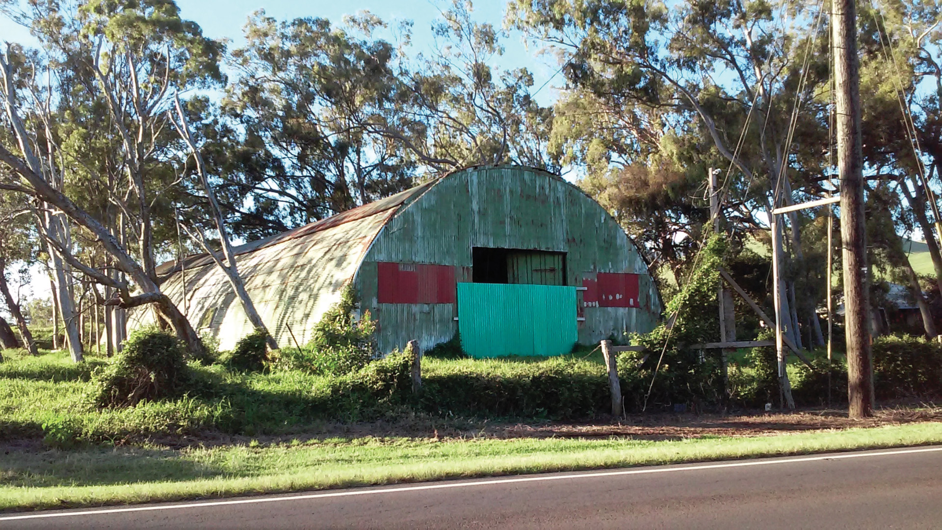 A derelict, rusting Quonset hut is all that remains of the sprawling Camp Tarawa on the Big Island of Hawaii.