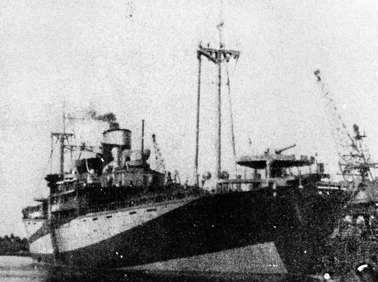 The Japanese ship Sagara Maru, in Singapore harbor in 1942, with camouflage of light gray and black. 