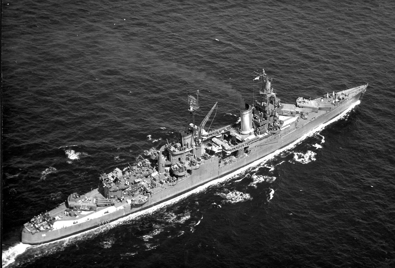 The USS Indianapolis (CA-35) sailing in 1943 or 1944. After the incident, only 317 men out of a total crew of 1,196 survived, making the incident the worst naval disaster in U.S. Navy history. 