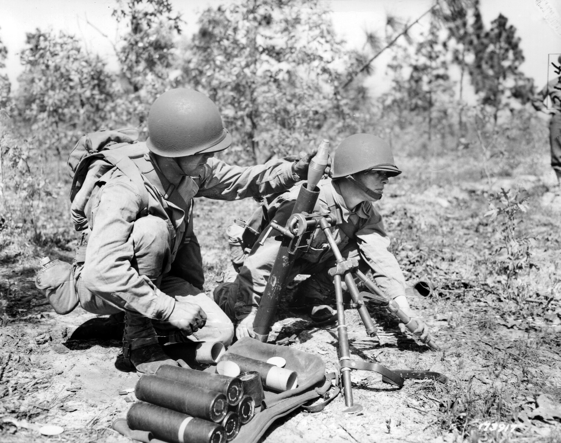 Two men from the 397th Infantry Regiment, 100th Division, fire a 60mm M2 mortar during training at Fort Jackson, South Carolina, in April 1943. The division—and Rincker—would be deployed to Europe in late September 1944. 