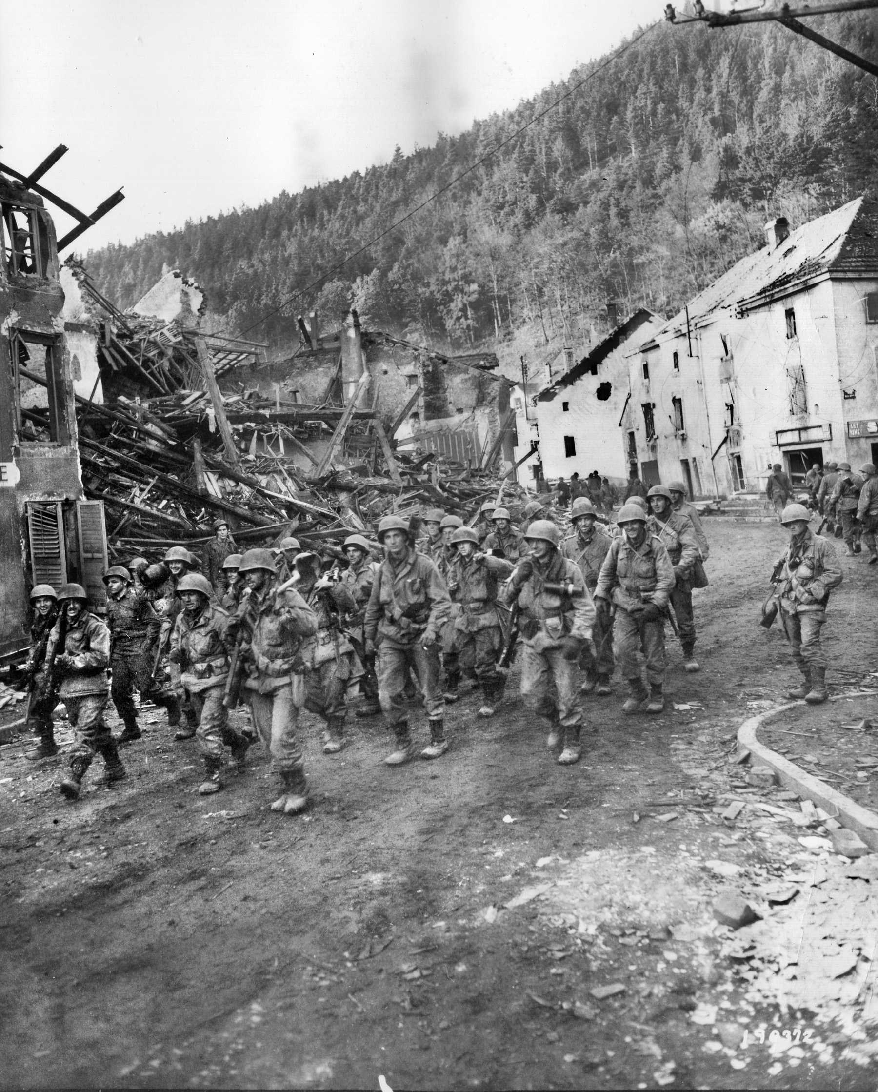 Men of Company C, 397th Regiment, move through the partially demolished town of Raon L’Étape, October 18, 1944. Rincker said his regiment lost 167 men killed and 511 men wounded during the Vosges campaign. 