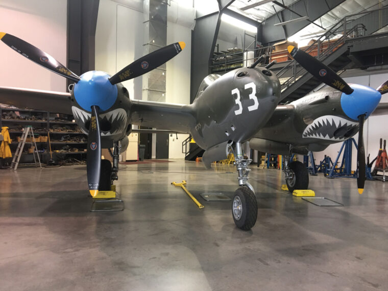 This pristine Lockheed P-38, “White 33,” was buried in a pit in the New Guinea jungle for decades before being retrieved and restored to better-than-new condition at the WestPac Restoration facility.