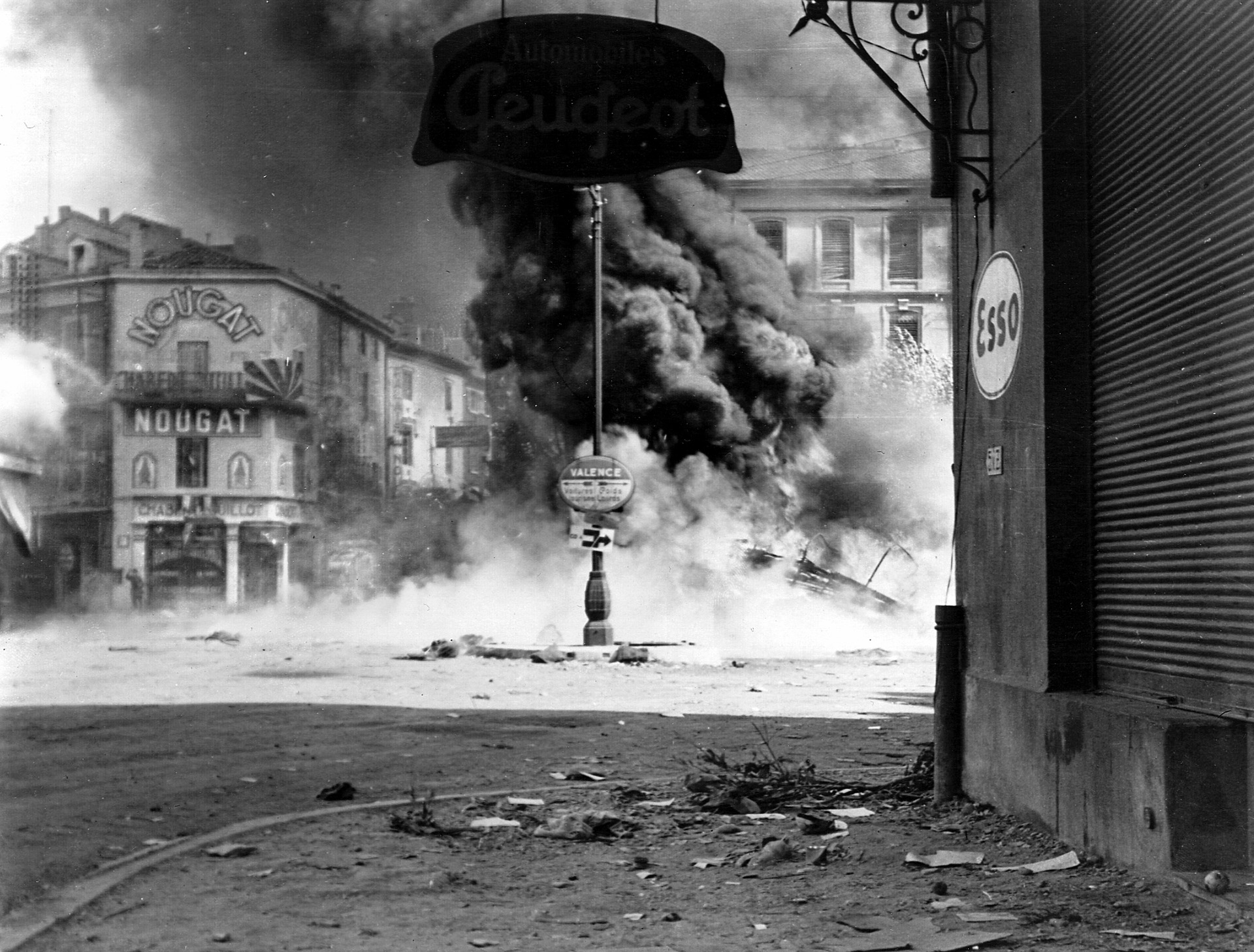  As the 36th Infantry Division is committed to the battle for the French town of Montelimar, German armored vehicles erupt in smoke and flame. The enemy forces in Montelimar had been caught in the open during an American fighter-bomber sweep as they attempted to retreat from the embattled town.