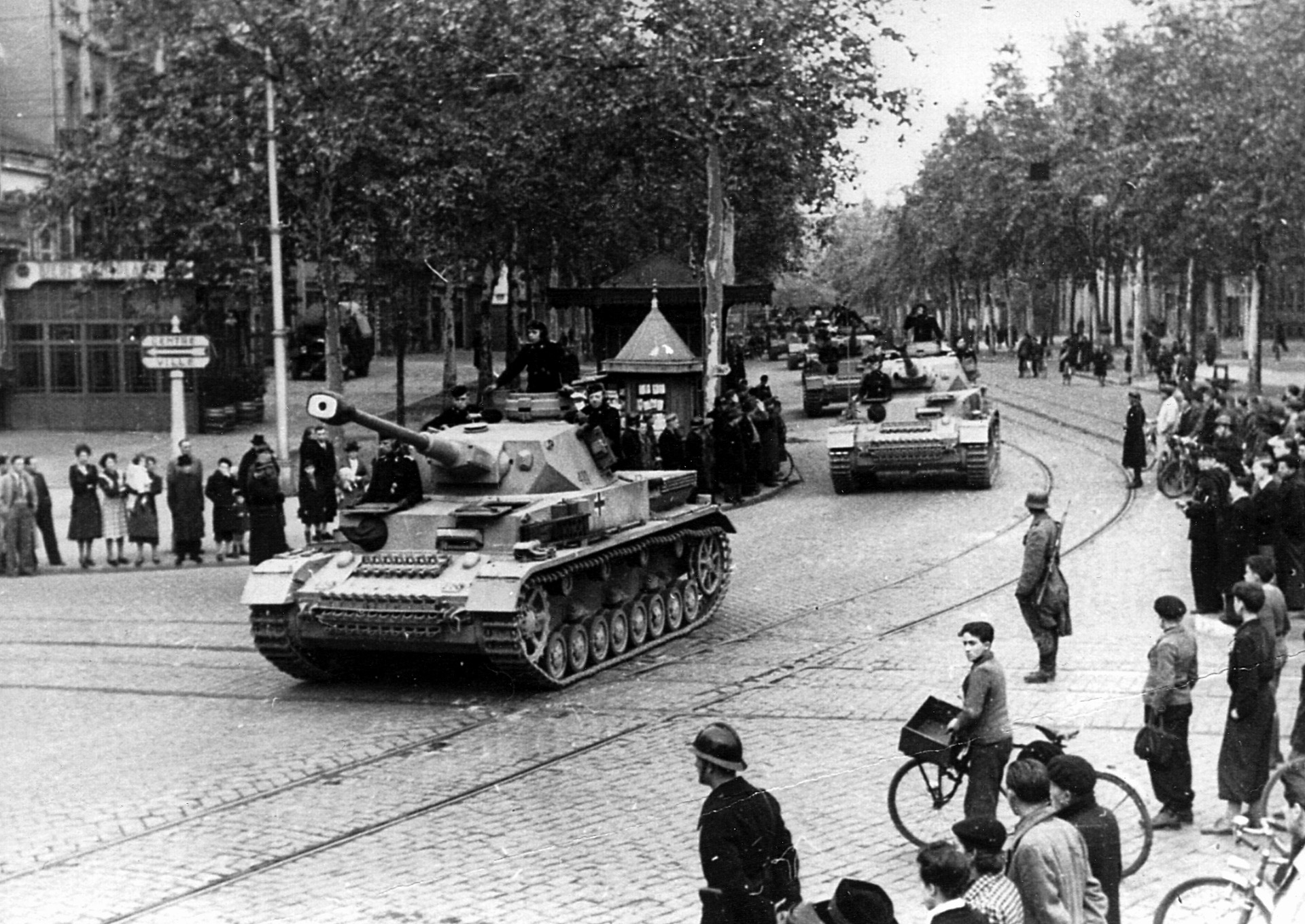 German tanks roll down a street in the city of Toulouse in southern France. The 11th Panzer Division was ordered south to stem the Allied tide prior to the landings of Operation Anvil-Dragoon, but it was ultimately battered and forced to retire. 
