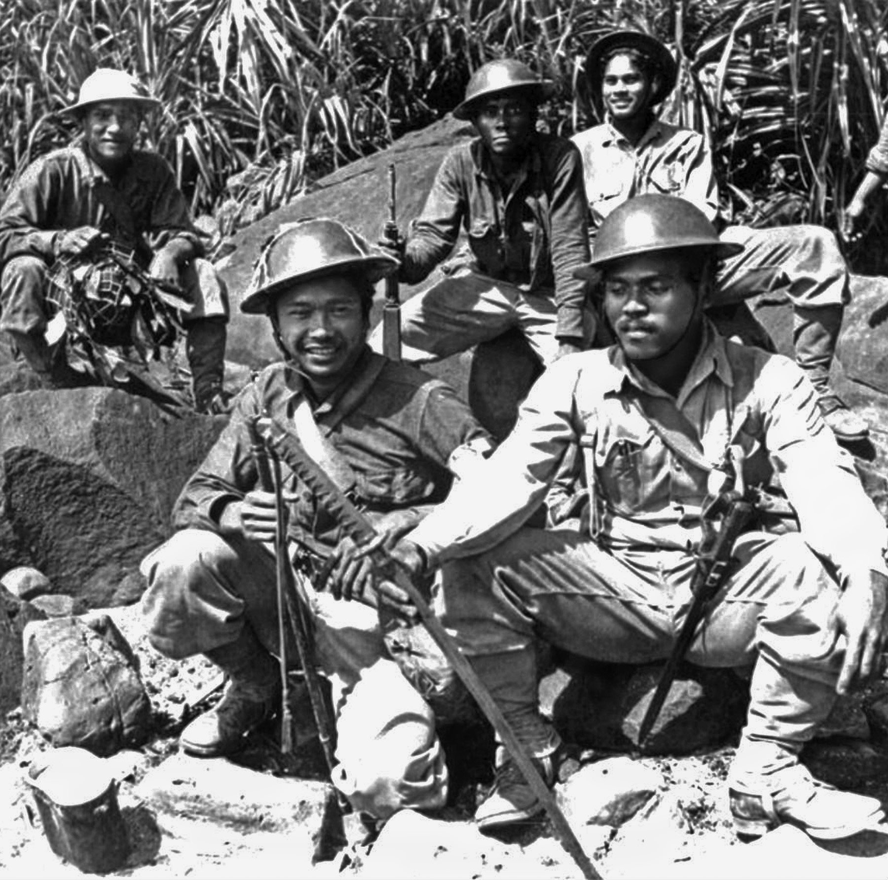 Dressed in U.S. Army uniforms, a unit of Filipino Scouts appears to be confident in its ability to halt the Japanese incursion.