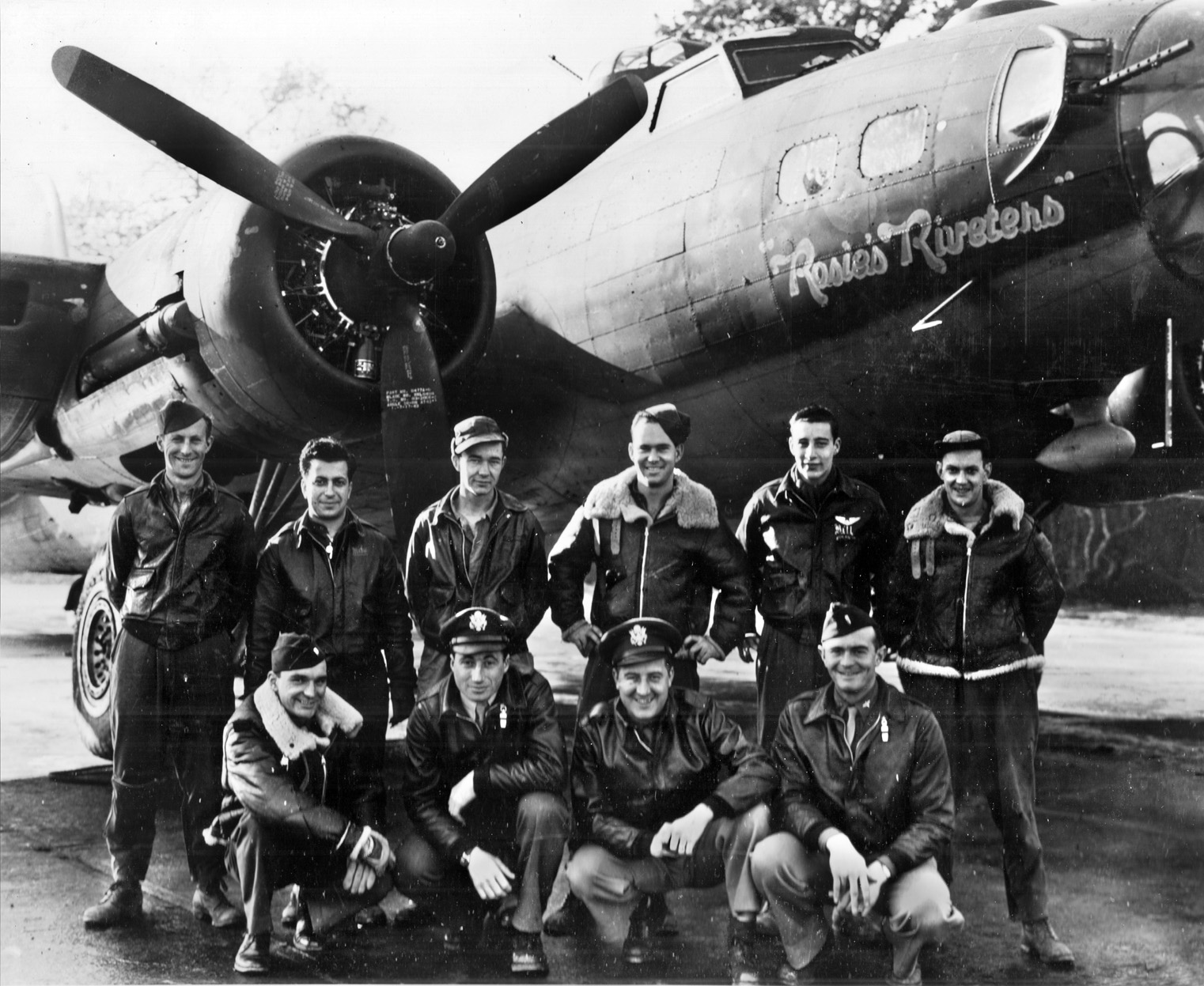 The crew of the 100th Bomb Group B-17 Rosie’s Riveters poses for a photographer with pilot Robert Rosenthal kneeling second from left. Of the 13 B-17s from the 100th Bomb Group that participated in the Münster raid, only Rosie’s Riveters returned. Most of the bomb groups suffered heavy casualities during the raid. 