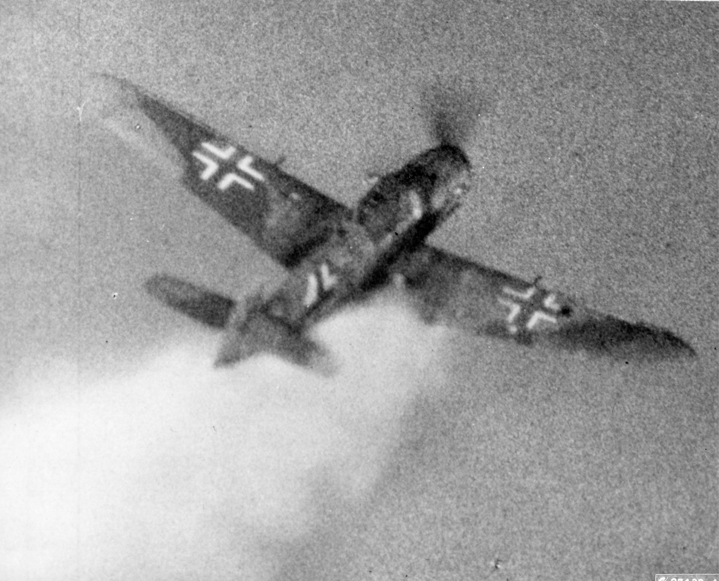 Gun camera footage from an American Republic P-47 Thunderbolt fighter escorting bomber formations captures the last moments of a Luftwaffe Focke Wulf Fw-190 fighter. German fighters broke off their attack as the American bombers entered the area of German antiairaft fire over Münster. 