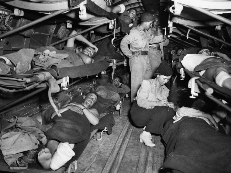 In July 1943, Lieutenant Katye Swope, a nurse with the 802nd Medical Air Evacuation Transport Squadron, prepares patients for a flight from Agrigento, Sicily, to Britain for further medical treatment. Allied air evacuation operations began during the campaign in North Africa in February 1943 and continued for the duration of World War II in every theater.