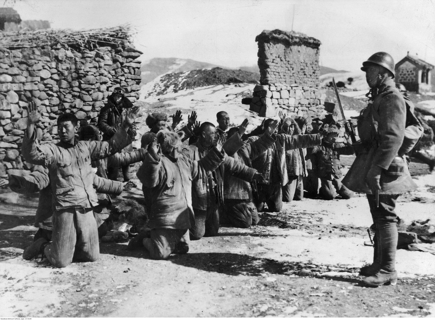 Japanese soldiers guard Chinese prisoners during the invasion of Manchuria, September 1931. Many prisoners of war, as well as civilians, were used as subjects in the horrific experiments. 