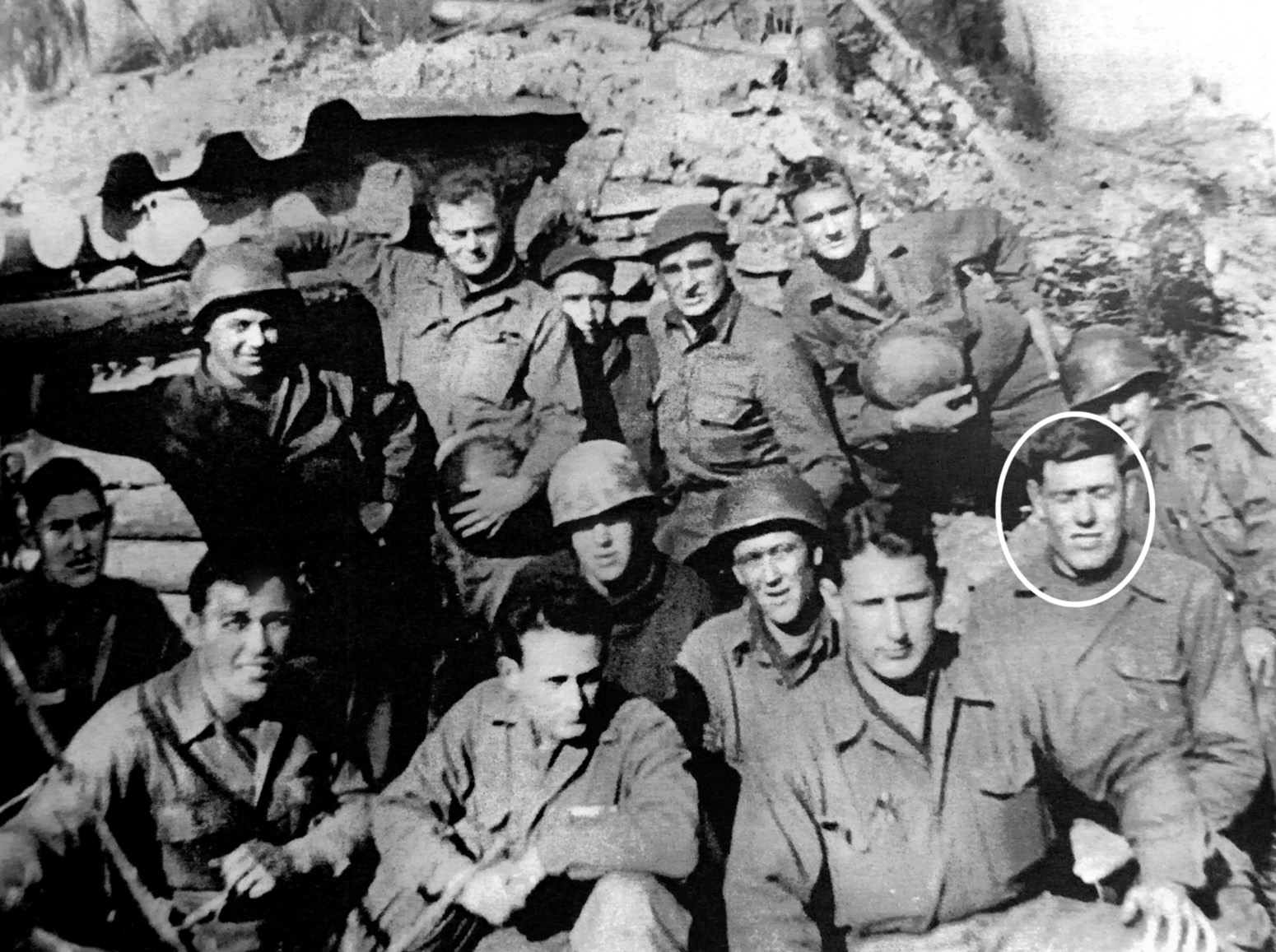 Clarence “Monty” Rincker (lower right, circled) and his 81mm mortar squad, photographed in February 1945 near the Maginot Line. 