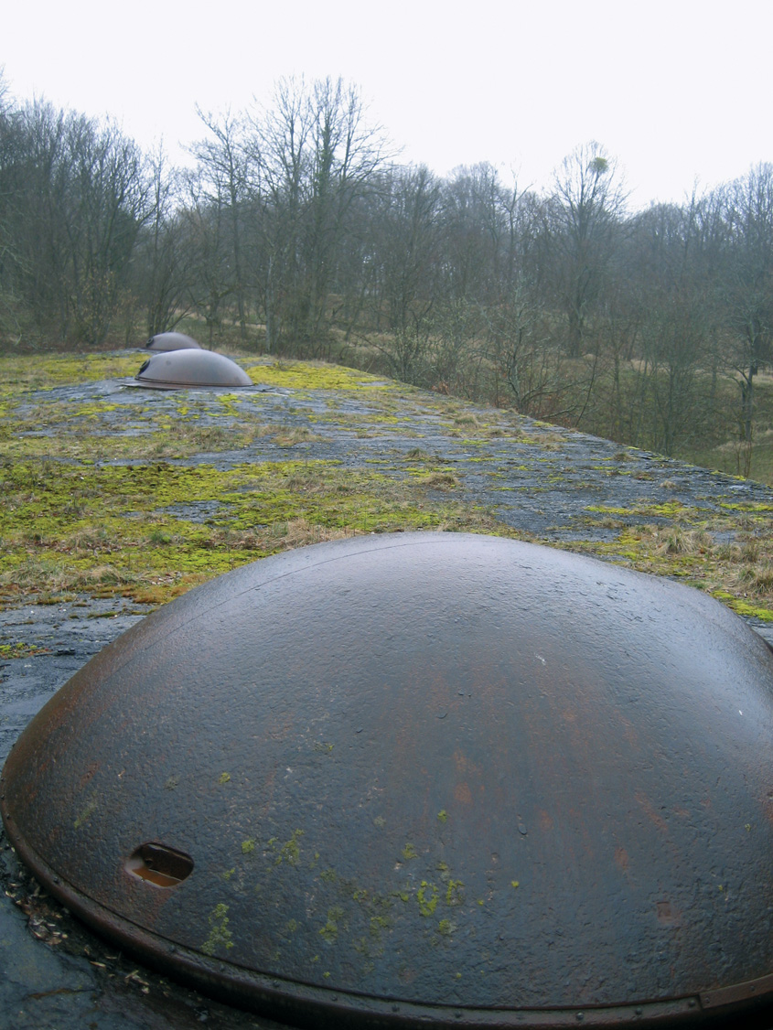The steel cupolas of Fort Driant as they appear today. Although derelict, the fort is still used by the French army for training purposes. 