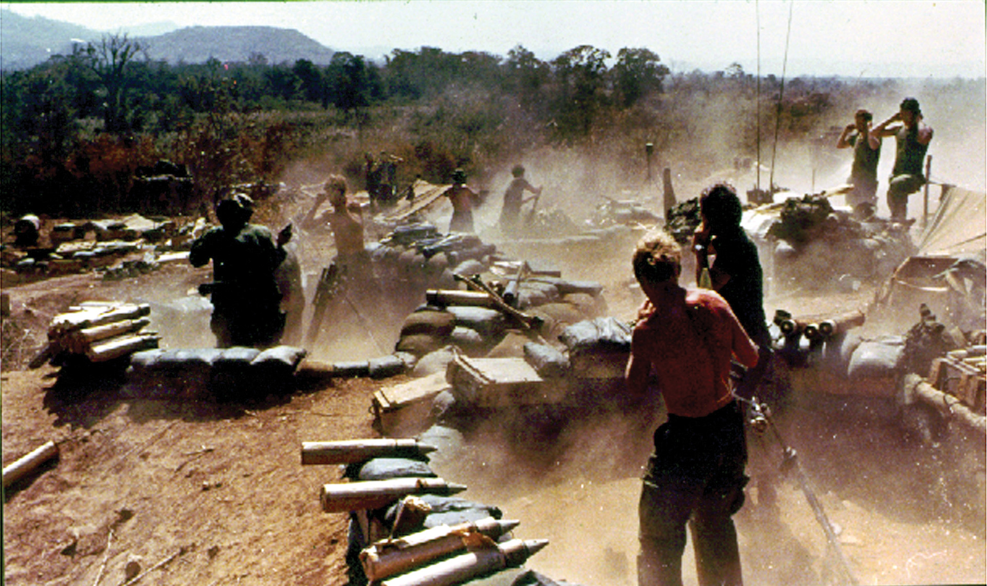 U.S. artillerymen near the Laotian border fire mortars into Laos in support of the advancing South Vietnamese. American helicopter units supplied the South Vietnamese throughout the operation. 