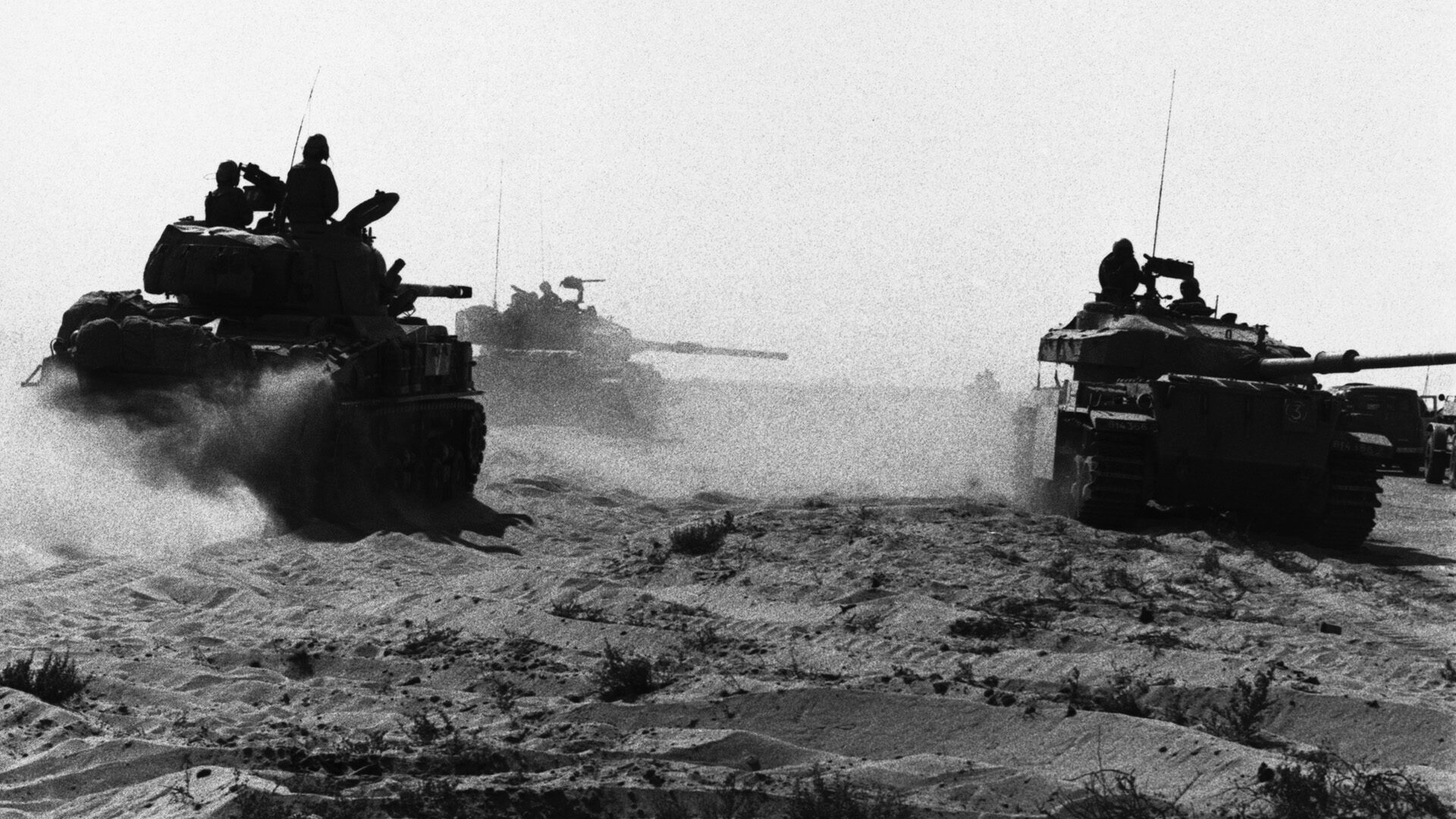 Israeli armor maneuvers in the Sinai Desert. The initial commitment of Israeli reserve units resulted in the loss of 100 tanks but blunted Egyptian efforts to expand the Sinai bridgehead. 