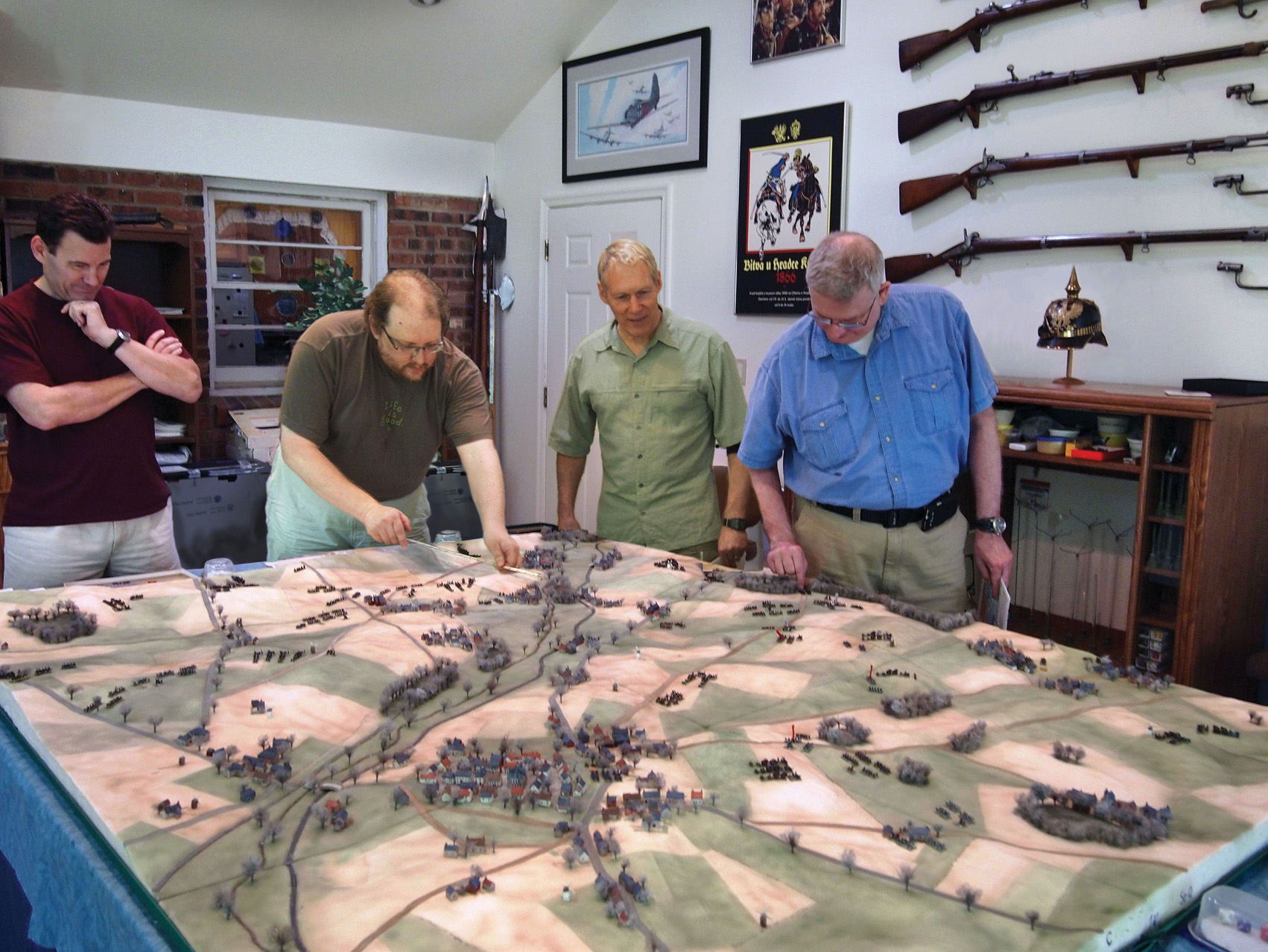 Participants refight the Battle of St. Quentin using the author’s 1:4000 scale terrain board representing about 65 square kilometers of the battlefield. Each infantry stand represents an infantry battalion, a battery, or two squadrons of cavalry.