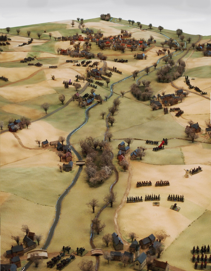 The battle situation as seen from the northeast about three-quarters of the way through the game shows the French 22nd Corps on the left falling back on its front, while the French 23rd Corps has withdrawn almost into the city. 