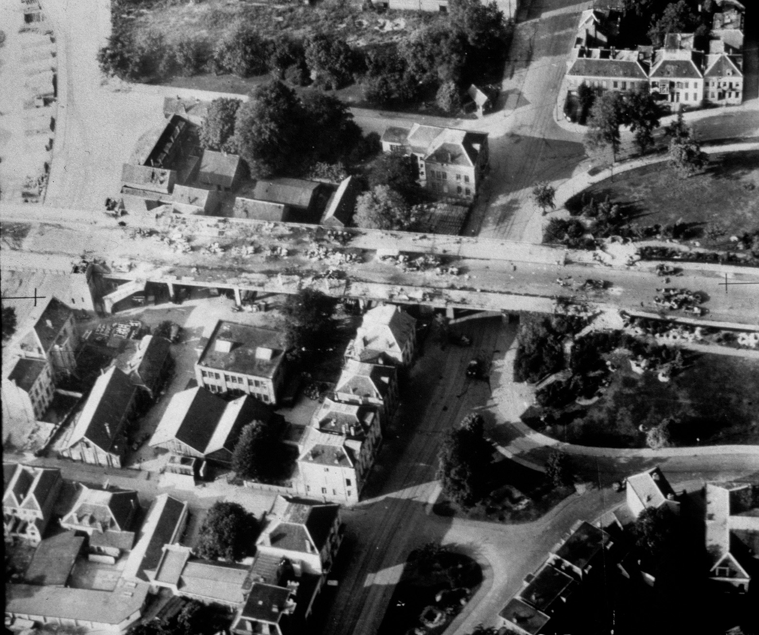 An RAF reconnaissance photo shows the damage British paratroopers inflicted to a German motorized column in a firefight on the north end of the Arnhem Highway Bridge on the second day of the operation.