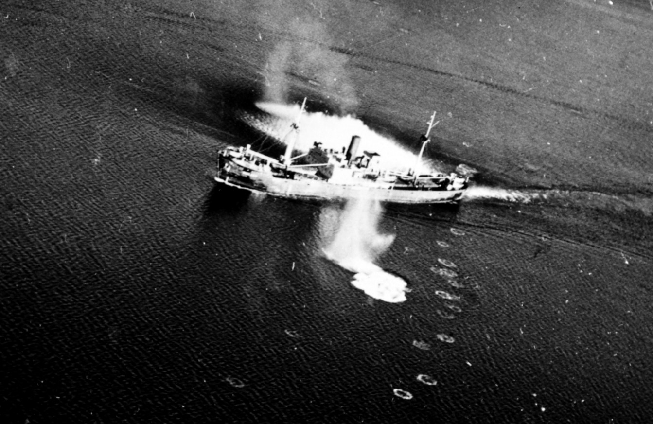 Bombs explode around the tanker Saarburg. Because of their training and combat experience, the American aviators had considerable success striking their targets.