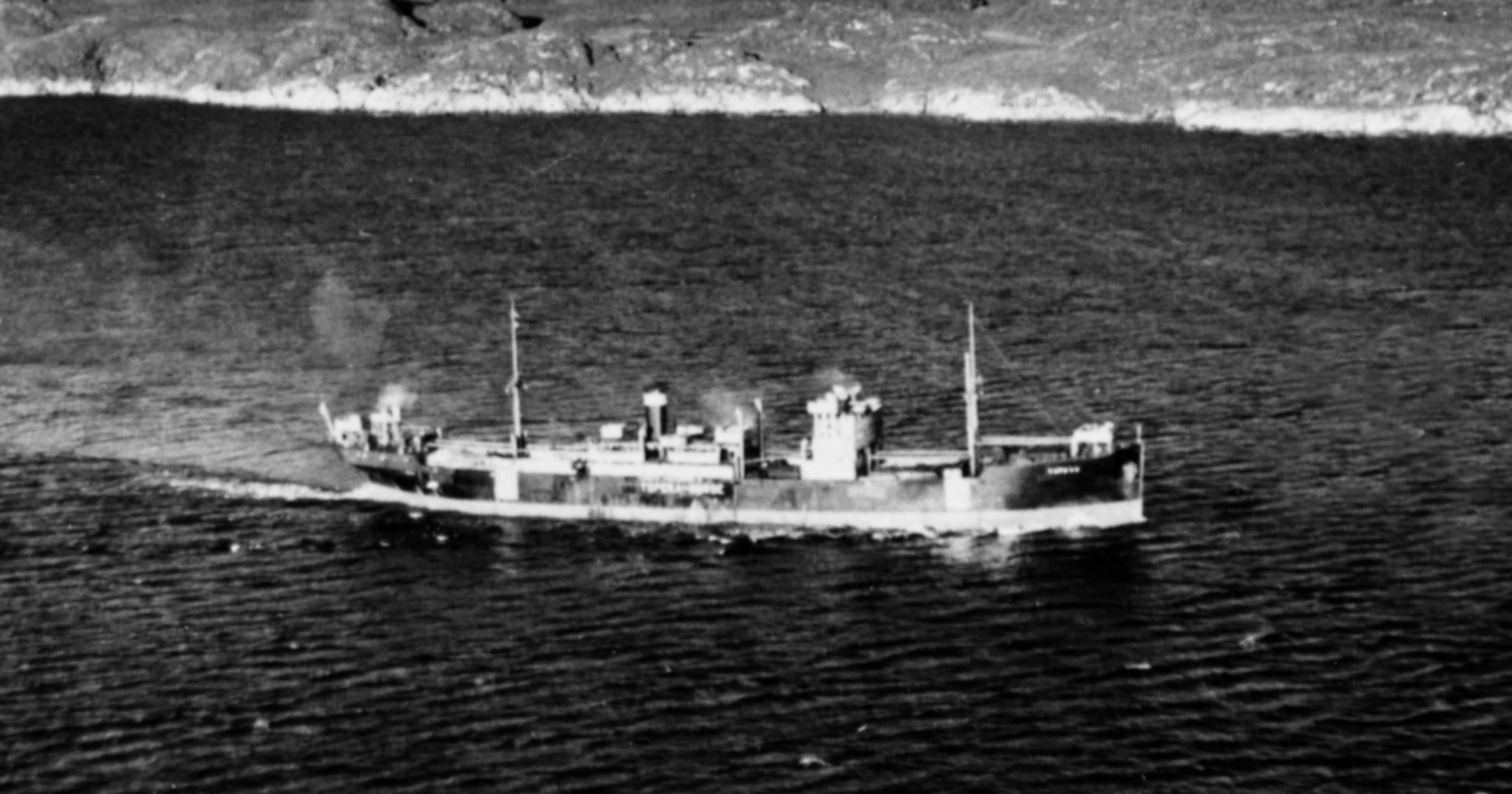 An Avenger torpedo bomber attacks the freighter Topeka, which was carrying building materials bound for Germany. Three Norwegian and eight German sailors died in the attack. 