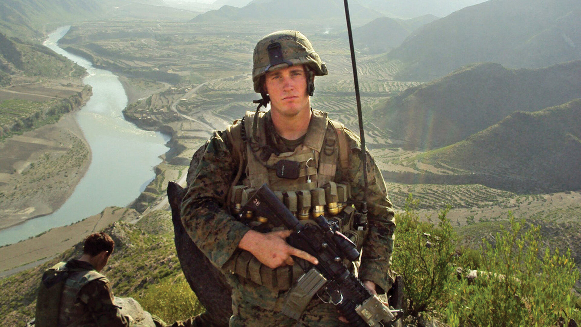 Marine Corporal Dakota Meyer, who trained Afghan National Security Forces in the use of weapons, took up a position with the quick reaction force during the security sweep of Ganjal village in September 2009.