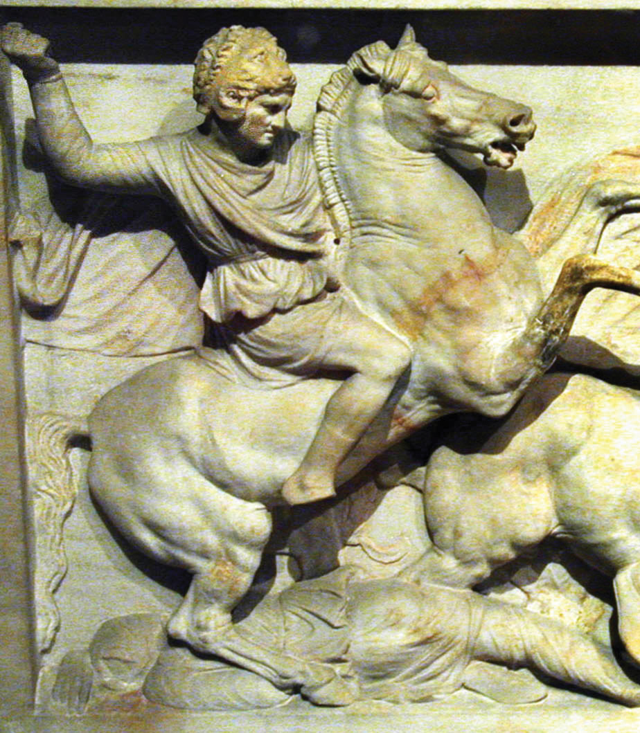 Detail from Alexander’s sarcophagus shows him mounted in battle wearing a lion’s head helmet.