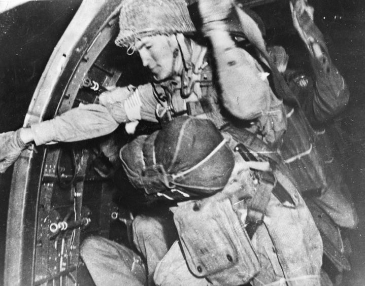  A paratrooper from the 82nd Airborne Division prepares to jump over Sicily.
