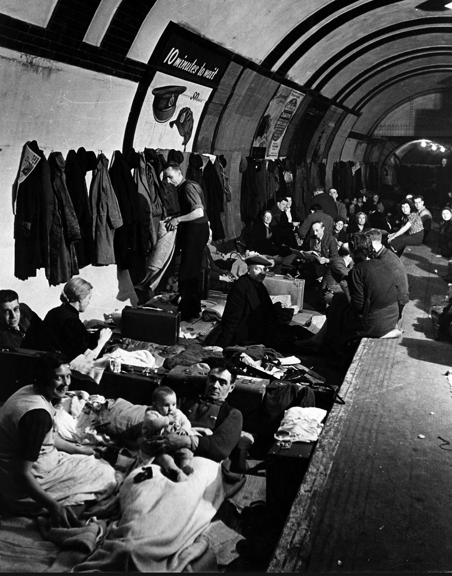 Citizens of London make do with their safe space in the city’s underground. The subway tunnels had few of the comforts of home, but Londoners found a sense of shared suffering and comradeship while the Nazi Luftwaffe rained bombs on their city.