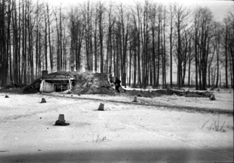 Sauvage and his fellow pilots often endured difficult living conditions like this shelter that has been dug into the ground during a period of cold weather and deep snow. 
