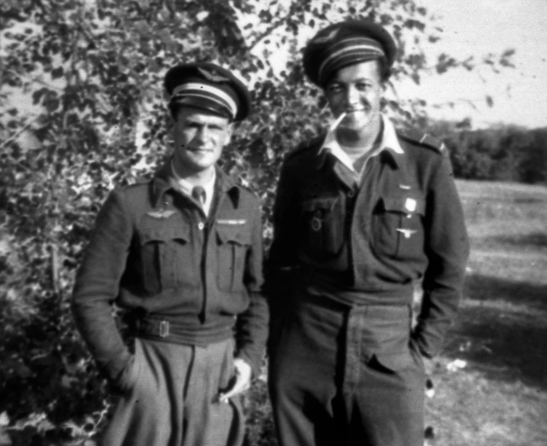 Veteran pilot Marcel Albert (left) is shown with his wingman Roger Sauvage. Albert chose Sauvage to serve in the vital role during hazardous fighter sorties. 