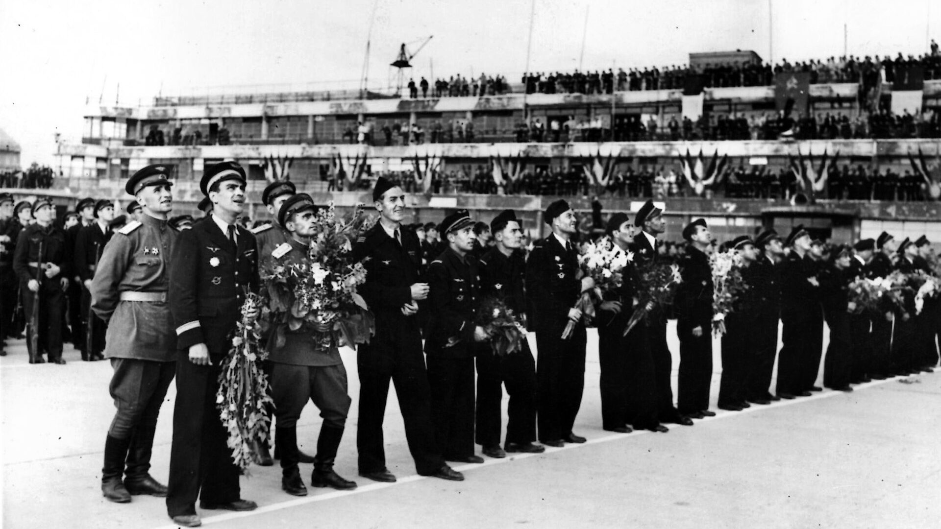 Upon their return to France in 1945, pilots of the Normandie Niemen are greeted at Bourget aerodrome. The group was hailed as heroes, and Roger Sauvage finished World War II with 16 confirmed aerial victories.