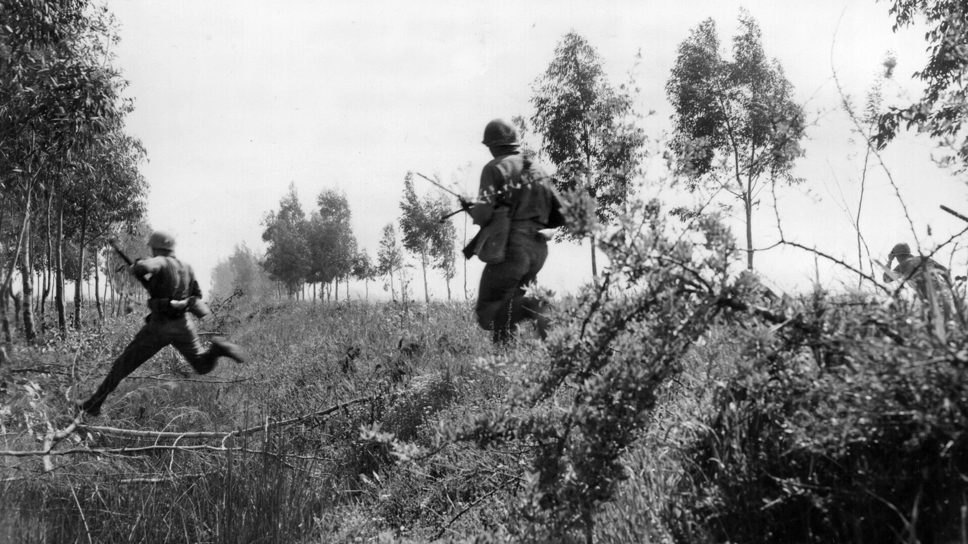 Soldiers of the 1st Special Service Force patrol the countryside from positions in Italy., The military unit was proposed by Geoffrey Pyke, and included men from both the United States and Canada.